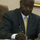 Uganda's President Yoweri Museveni signs the Anti-Homosexuality bill on February 24, 2014 in Entebbe.
ISAAC KASAMANI/AFP/Getty Images
